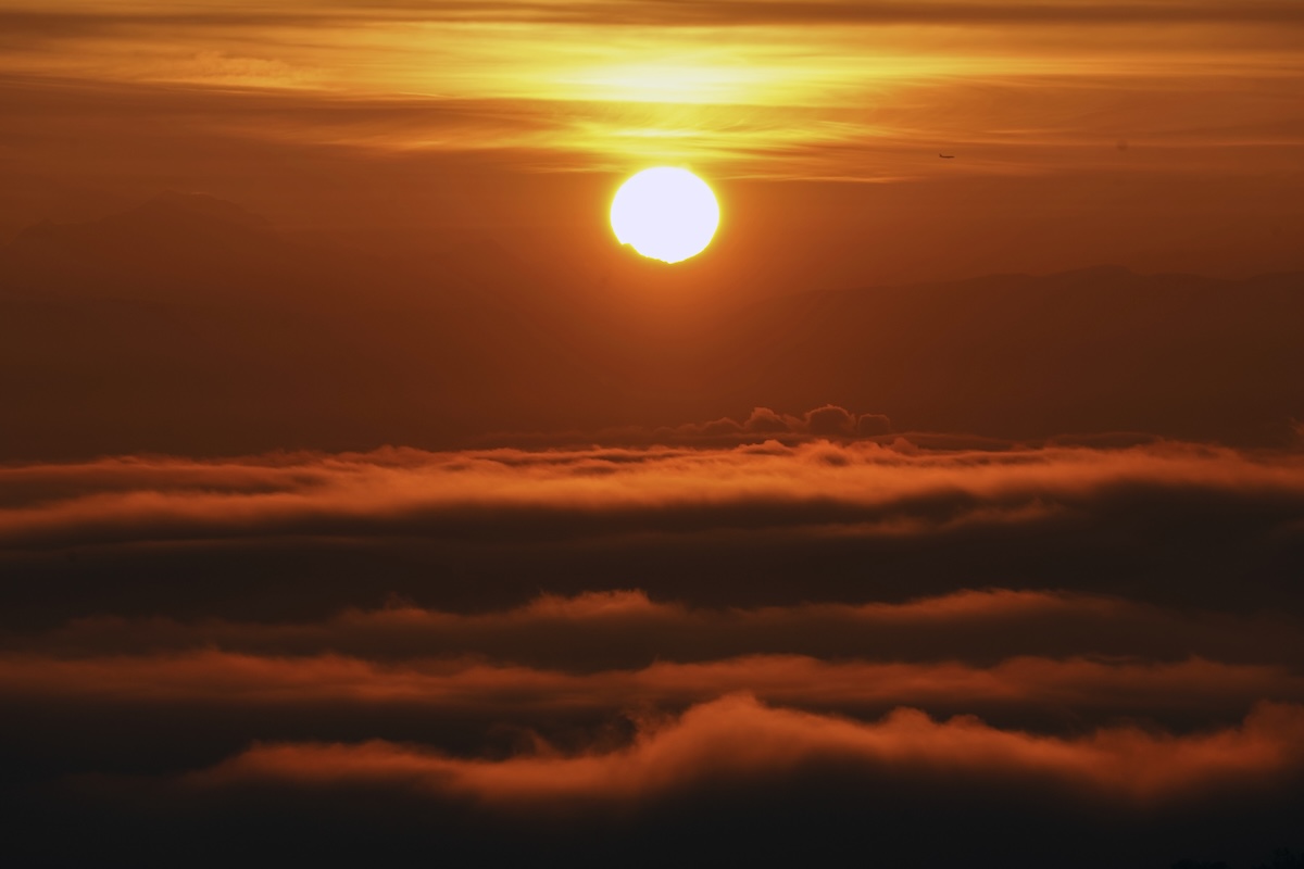 Sun rises over the Alps for Trump promises