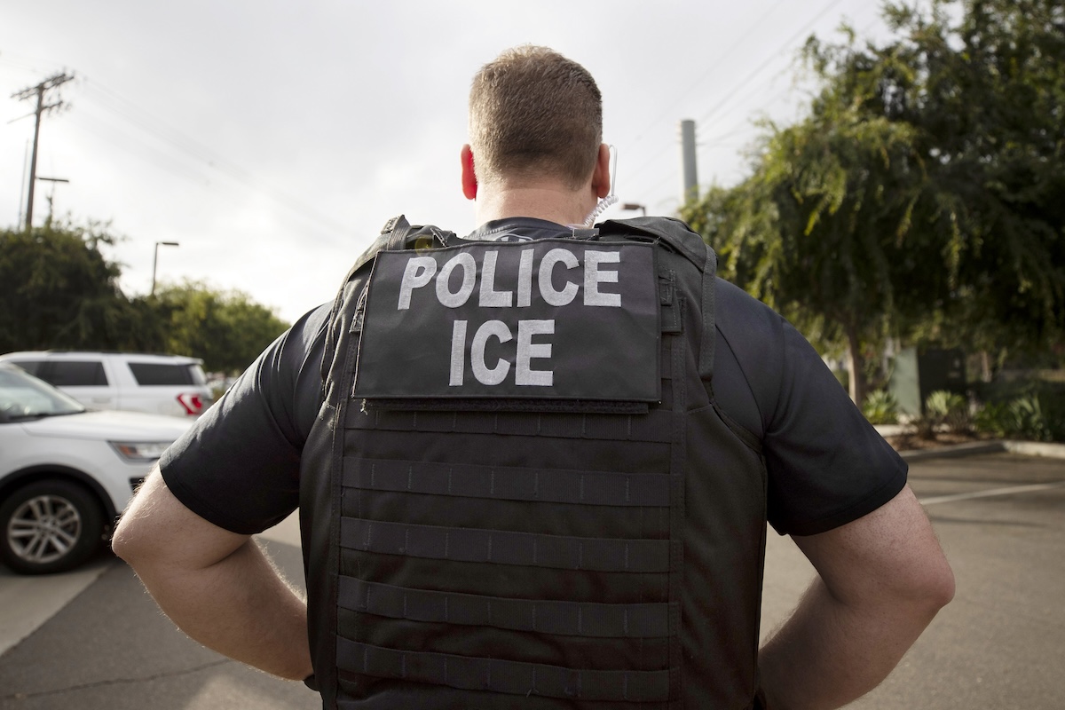 ICE officer back facing camera in Escondido, Calif., 7-8-2019