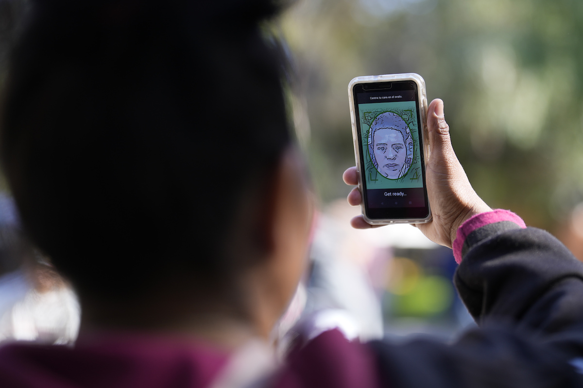 Migrant using CBPOne App