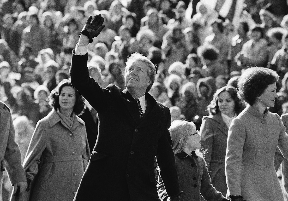 Jimmy Carter waves to crowd during inauguration 01-20-1977