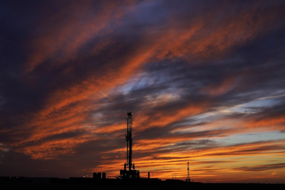 Oil rigs at sunset