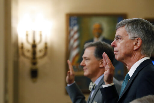 Taylor and Kent being sworn in