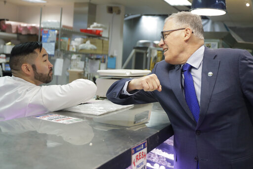 Inslee greeting worker