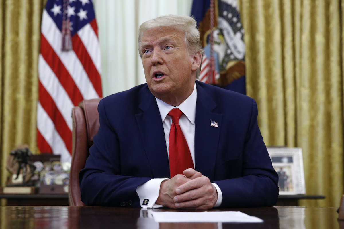 Trump at his desk (Trump-O-Meter)