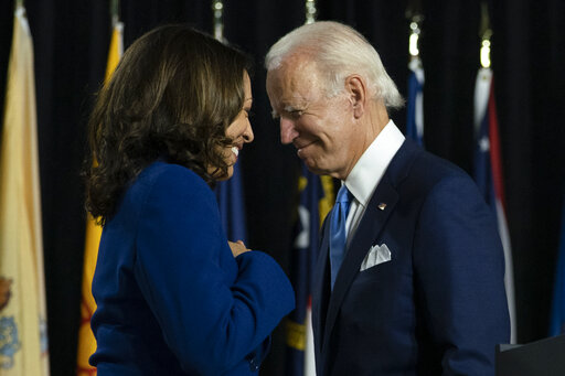 Biden Harris facing each other