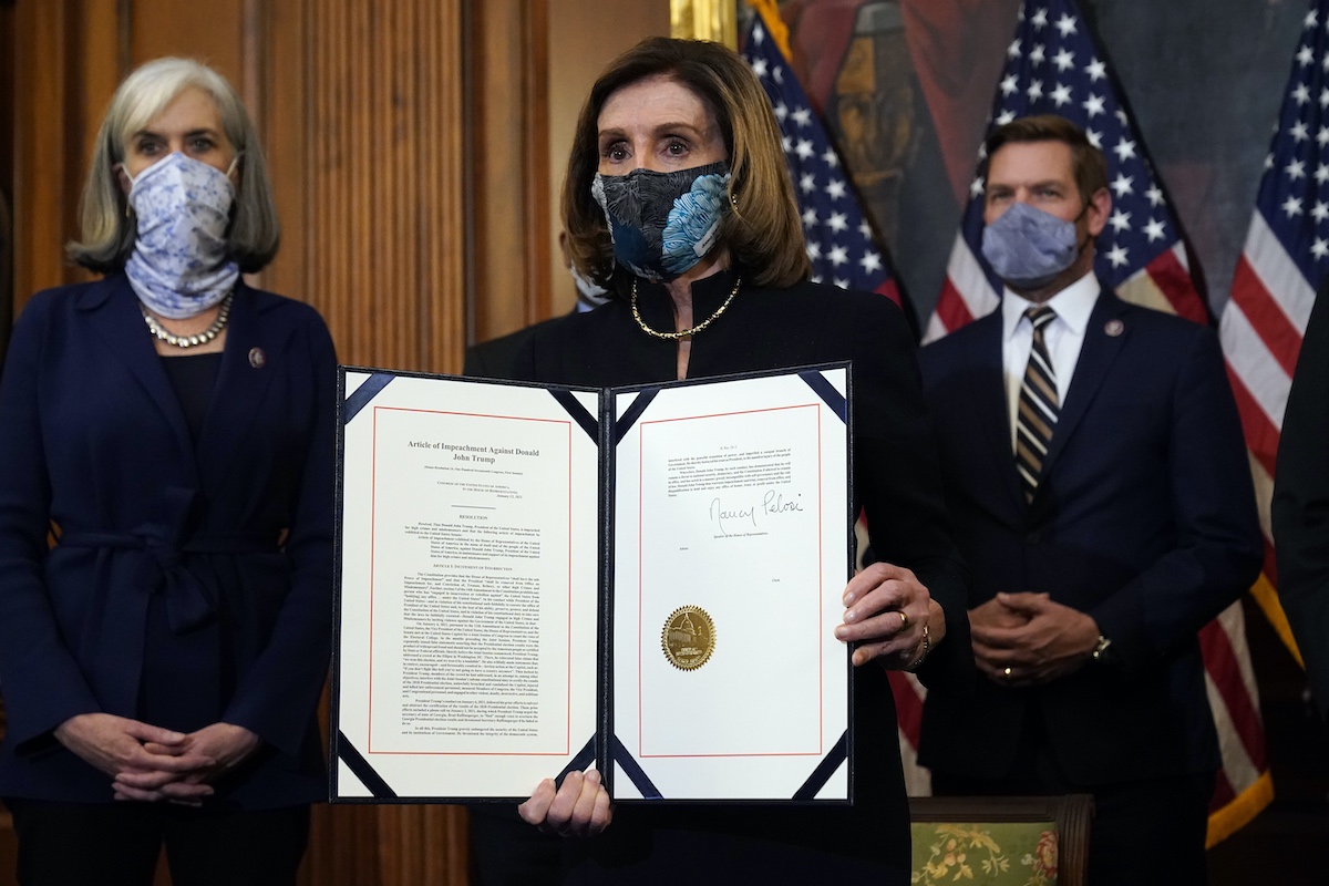 Pelosi with the article of impeachment against Trump on Jan. 13, 2021