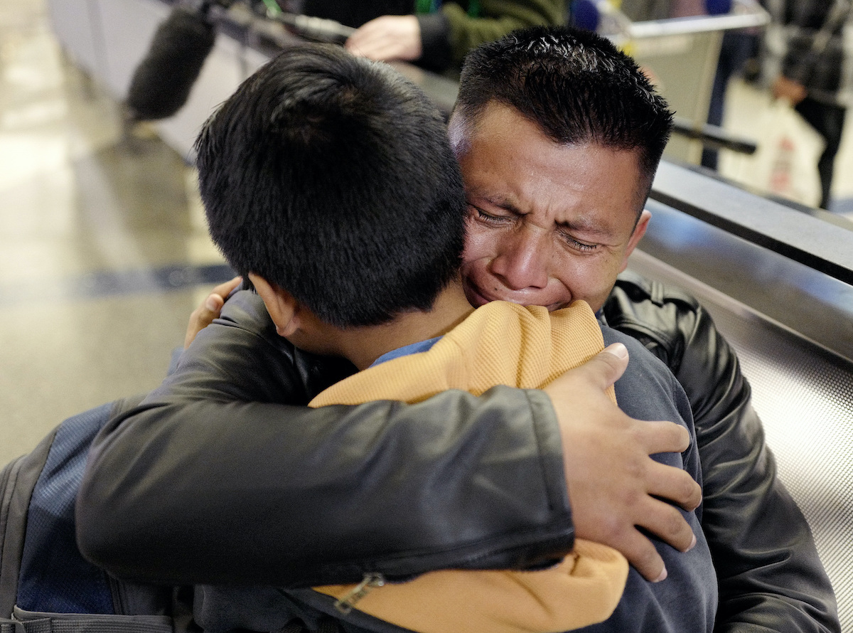 reunited immigrant family 2020