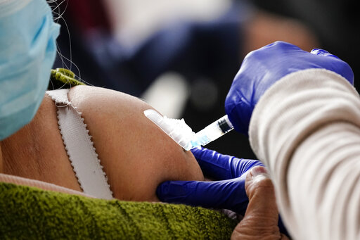 Covid shot in arm