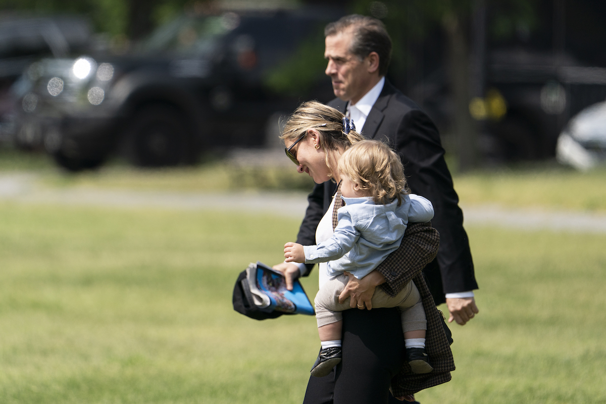 Hunter Biden walking with child May 2021