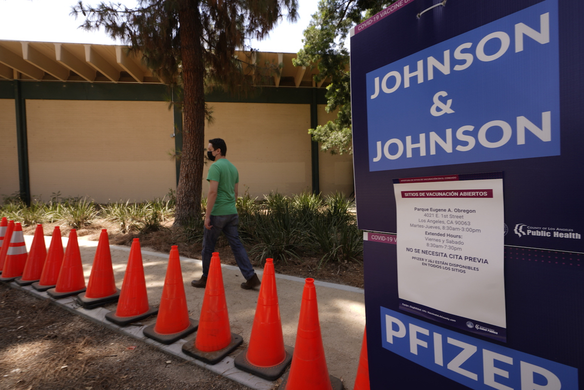 Los Angeles man walking to get COVID-19 vaccine July 2021