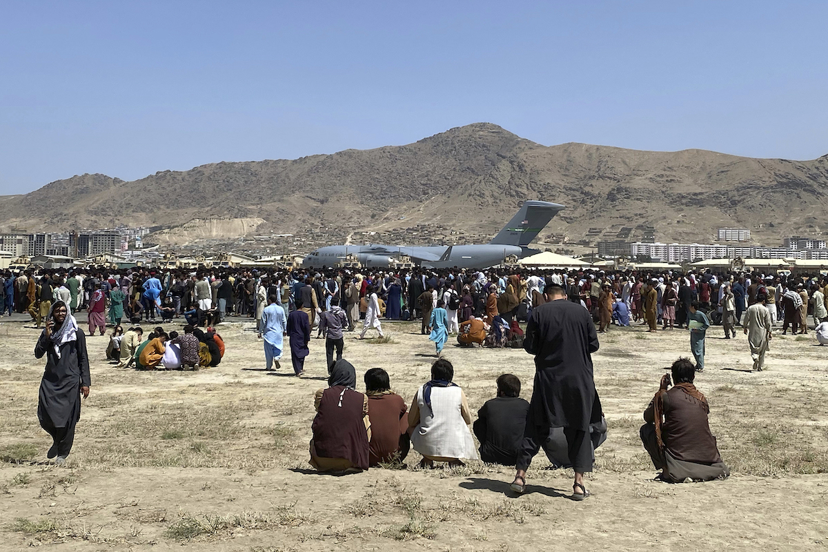 Migrants Afghan airport art for Charlie Kirk fact-check