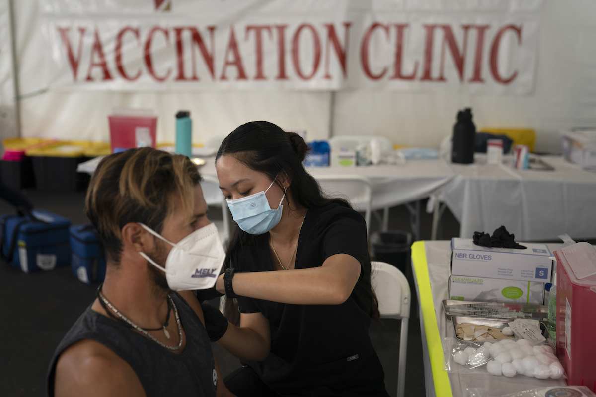 Vaccination photo for COVID endemicity story