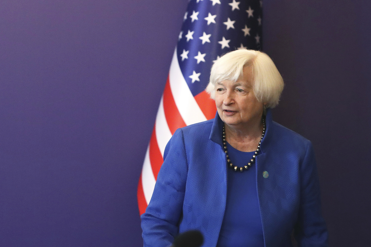 Janet Yellen and flag