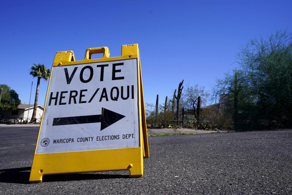 Vote here/vote aqui sign Phoenix, Arizona sign Oct. 12, 2022