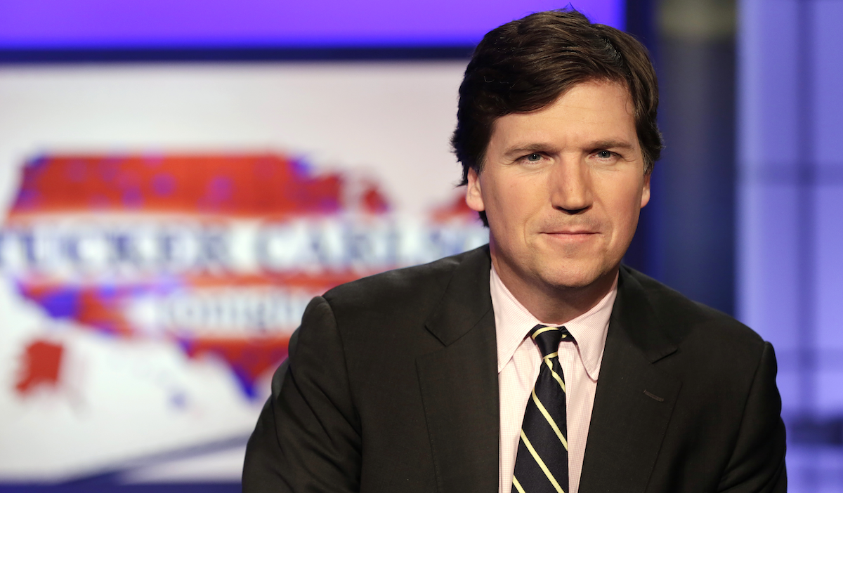 Tucker Carlson photo against show logo