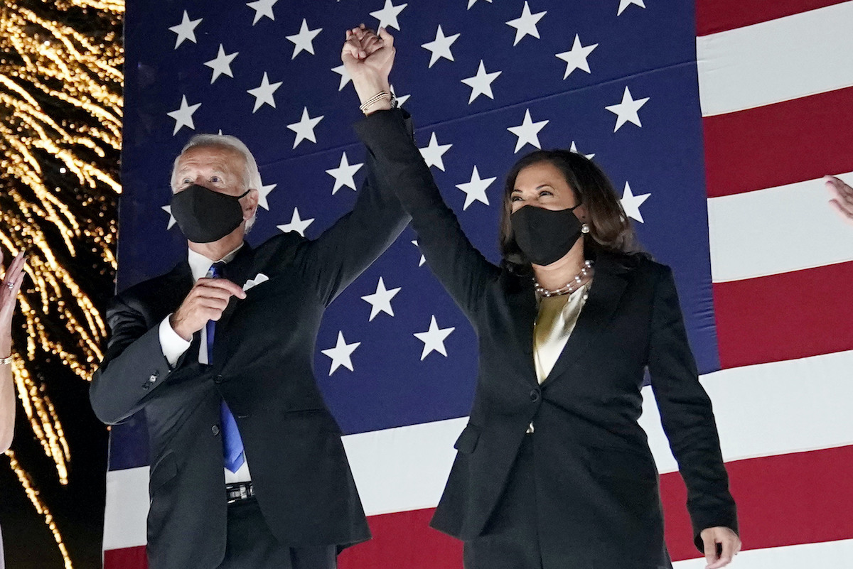 Biden and Harris with fireworks