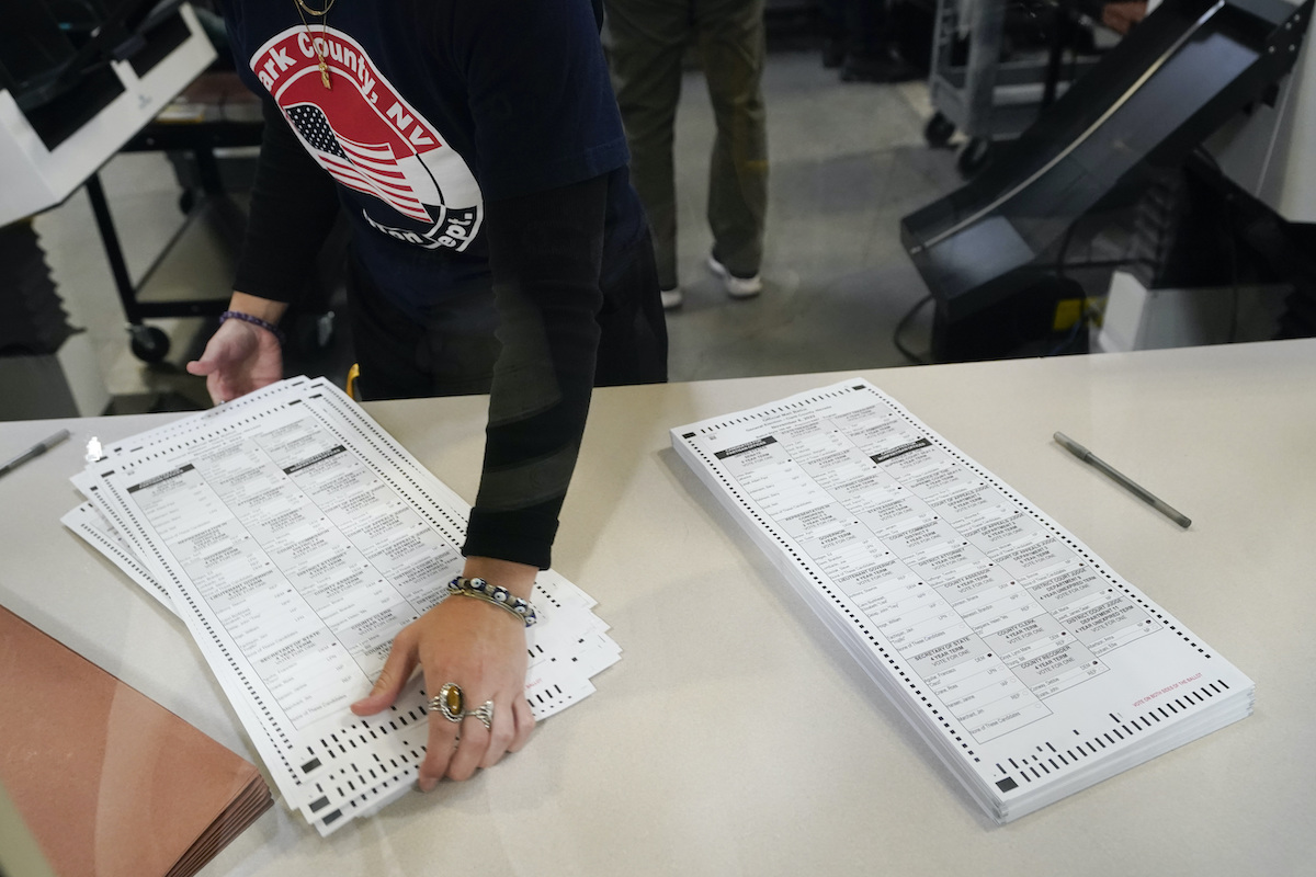 Clark County Nevada election worker w ballots 11-9-22