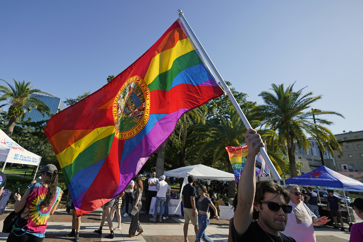 LGBTQ rights flag at Florida protest in Orlando