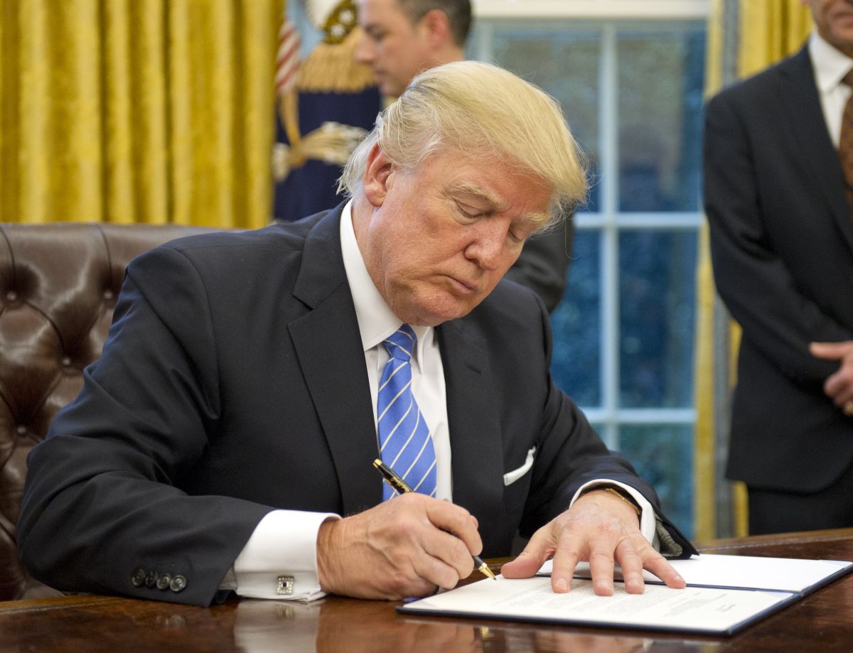 Trump signing EO on Jan. 23