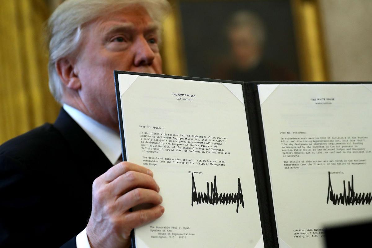 Trump holds up tax bill