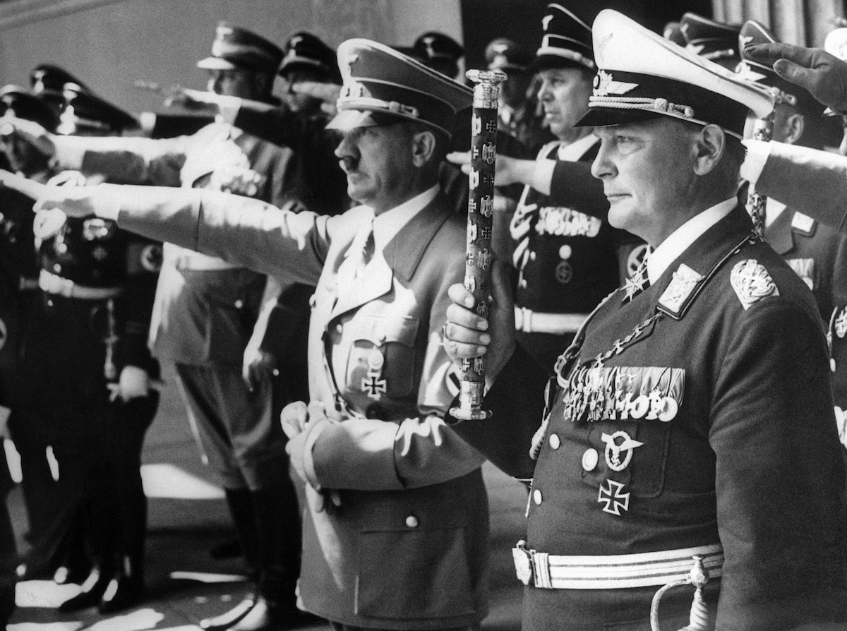 Hermann Goering, right, pictured with Adolf Hitler, center, during the ceremony in Berlin on June 6, 1939.