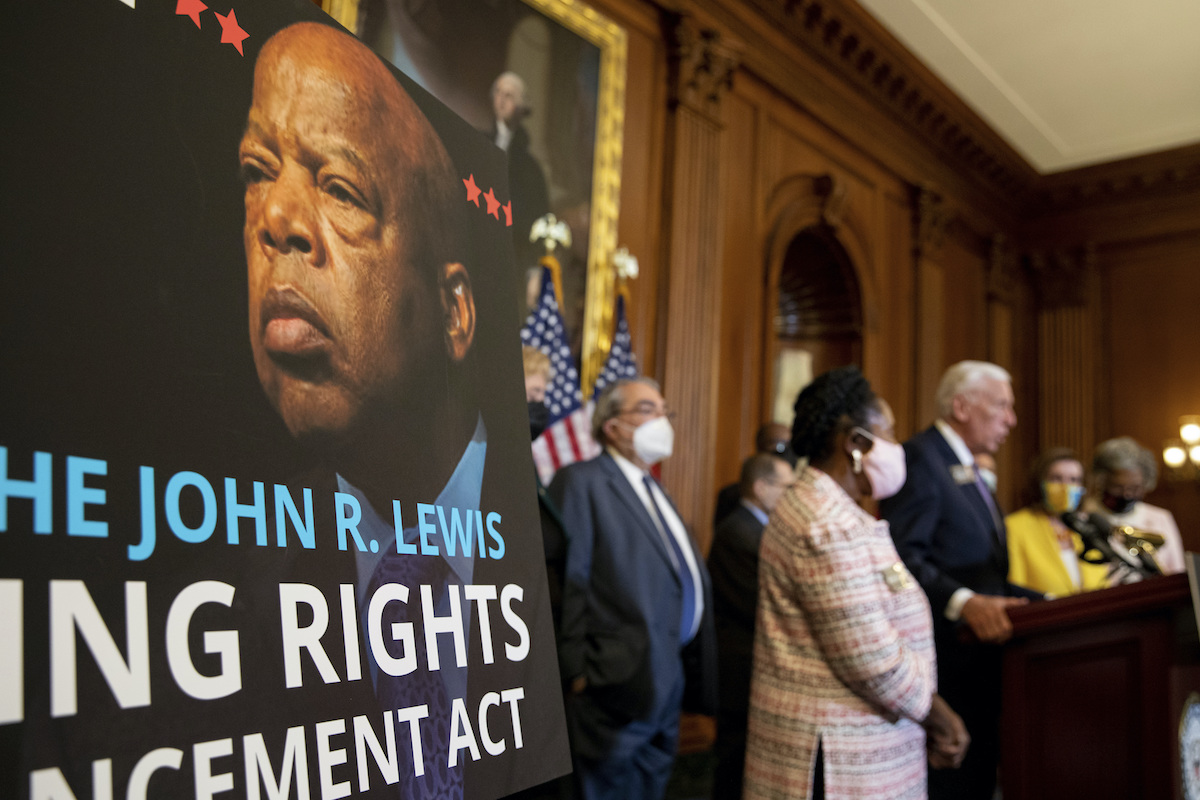 Poster with John Lewis related to voting rights act 8-24-21