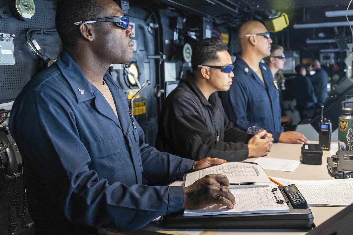 Navy Sailors aboard the USS Portland