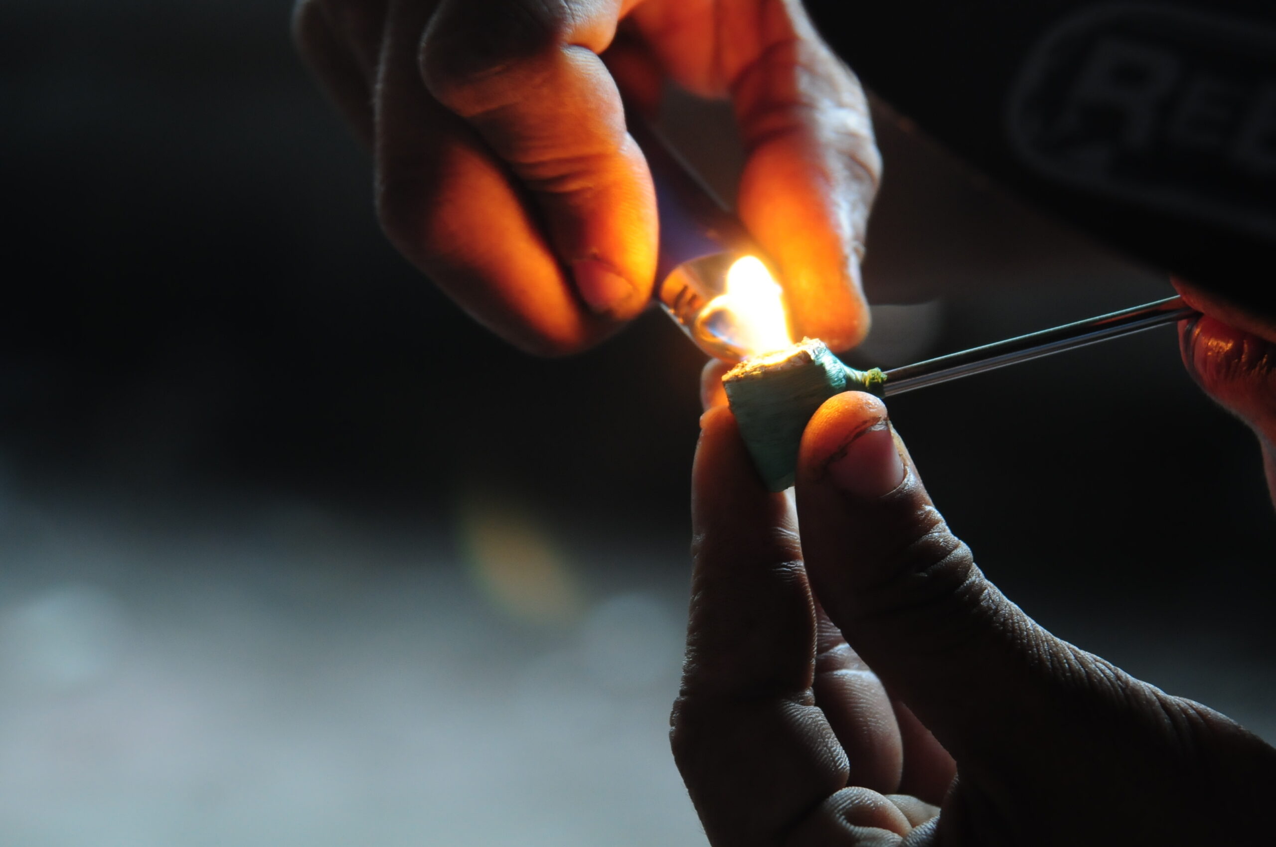 person using a crack pipe