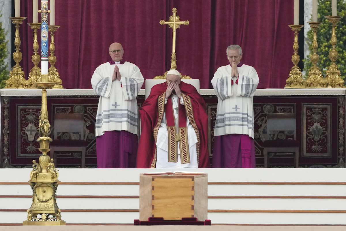 Pope Francis at Pope Benedict's funeral