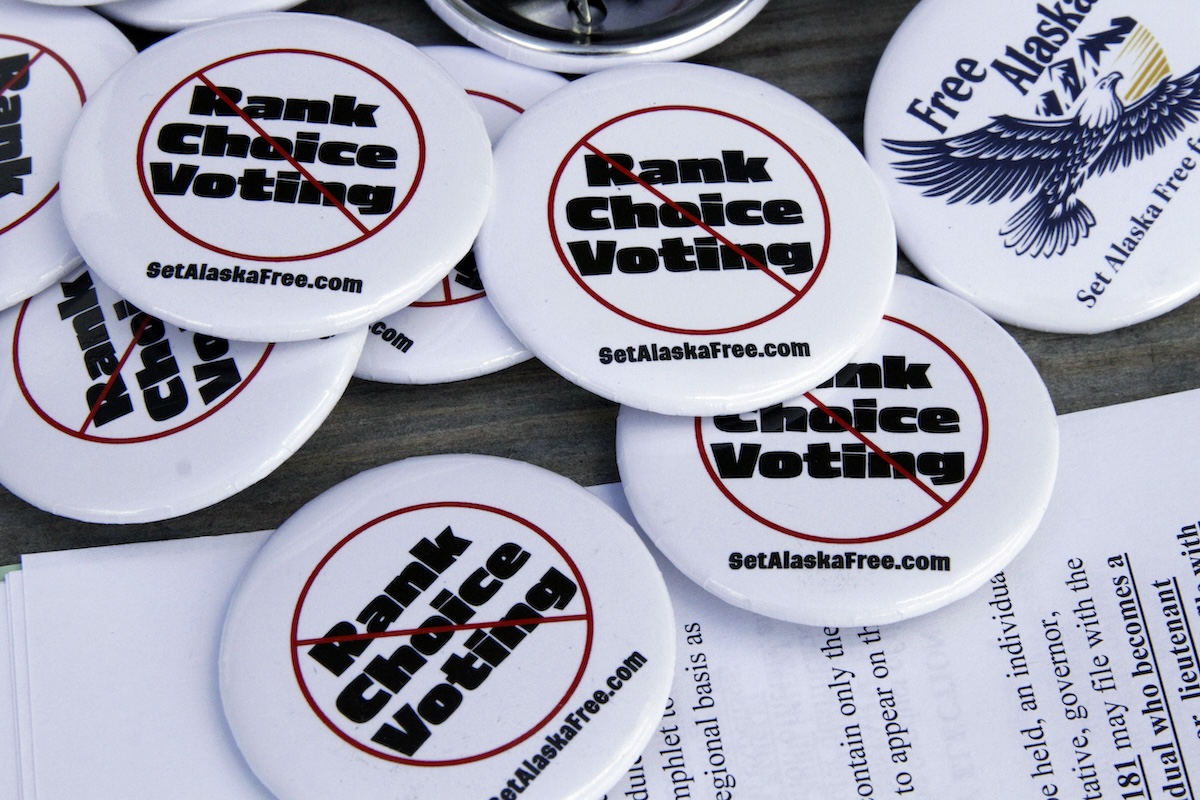 Repeal ranked-choice voting buttons on a table, 05-14-2024
