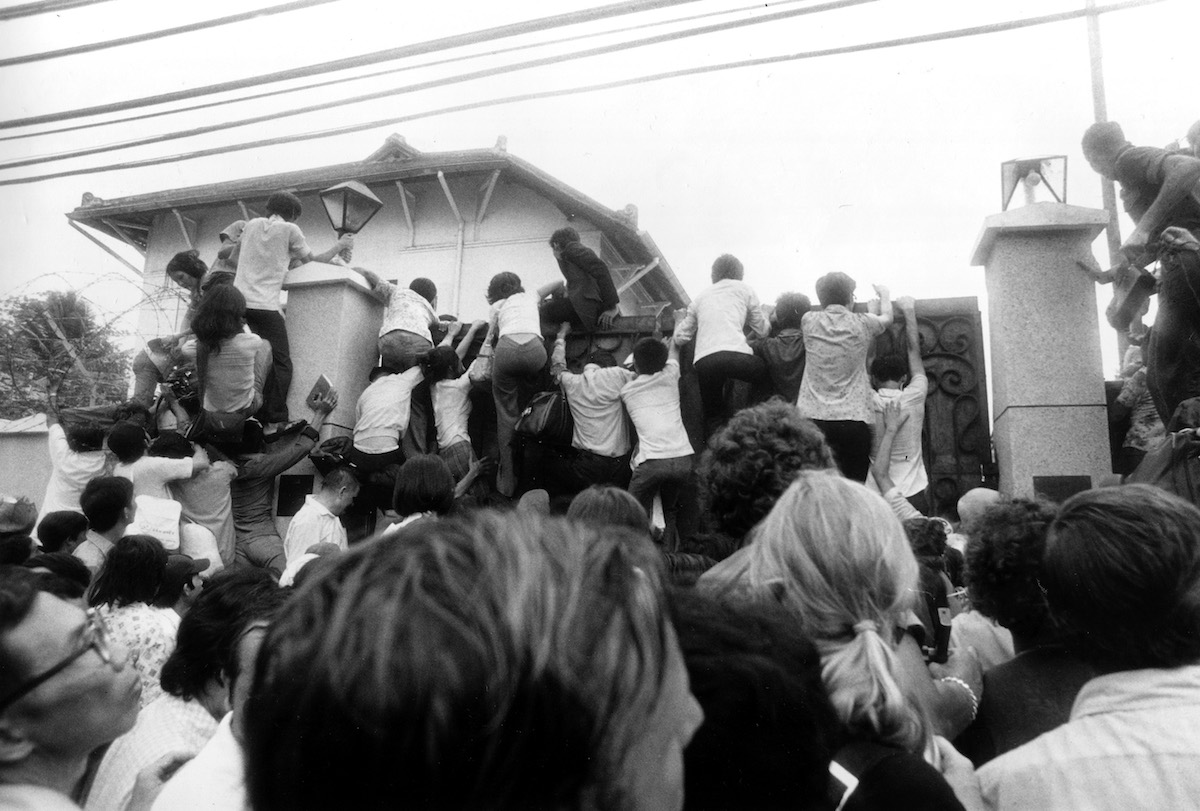 Saigon scaling embassy wall
