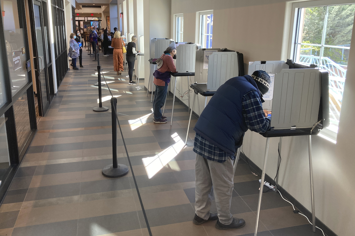 Sante Fe New Mexico voters fill out ballots 10-11-22