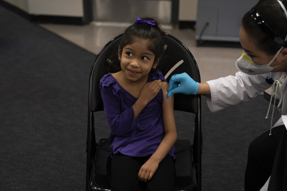 Six-year-old kid receives COVID-19 vaccine