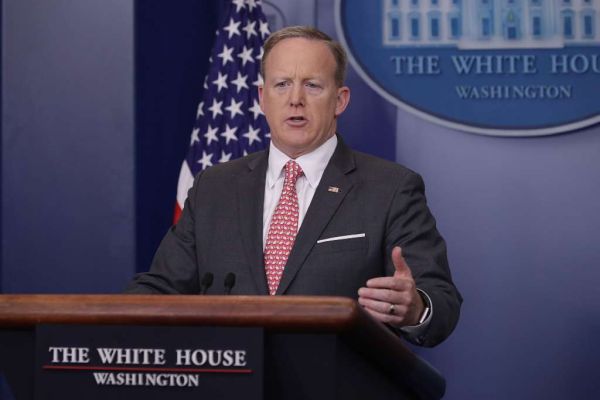 Spicer at the podium