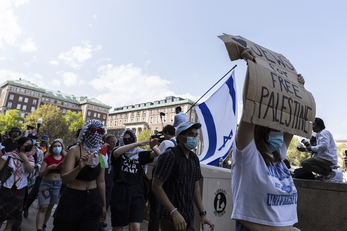 Student protesters march round their encampment on the Columbia University campus 04-29-2024