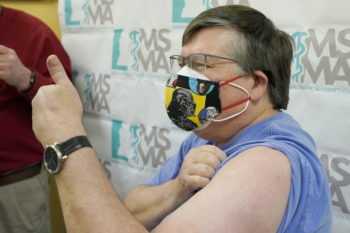 Man giving thumbs up for covid vaccination Mississippi Dec 2020