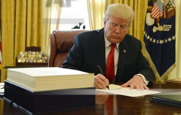 Trump signing tax bill