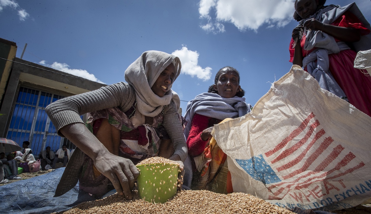 Image accompanying From the U.S. Agency for International Development funding, “10 to 30 cents on the dollar is what actually goes to aid.”
