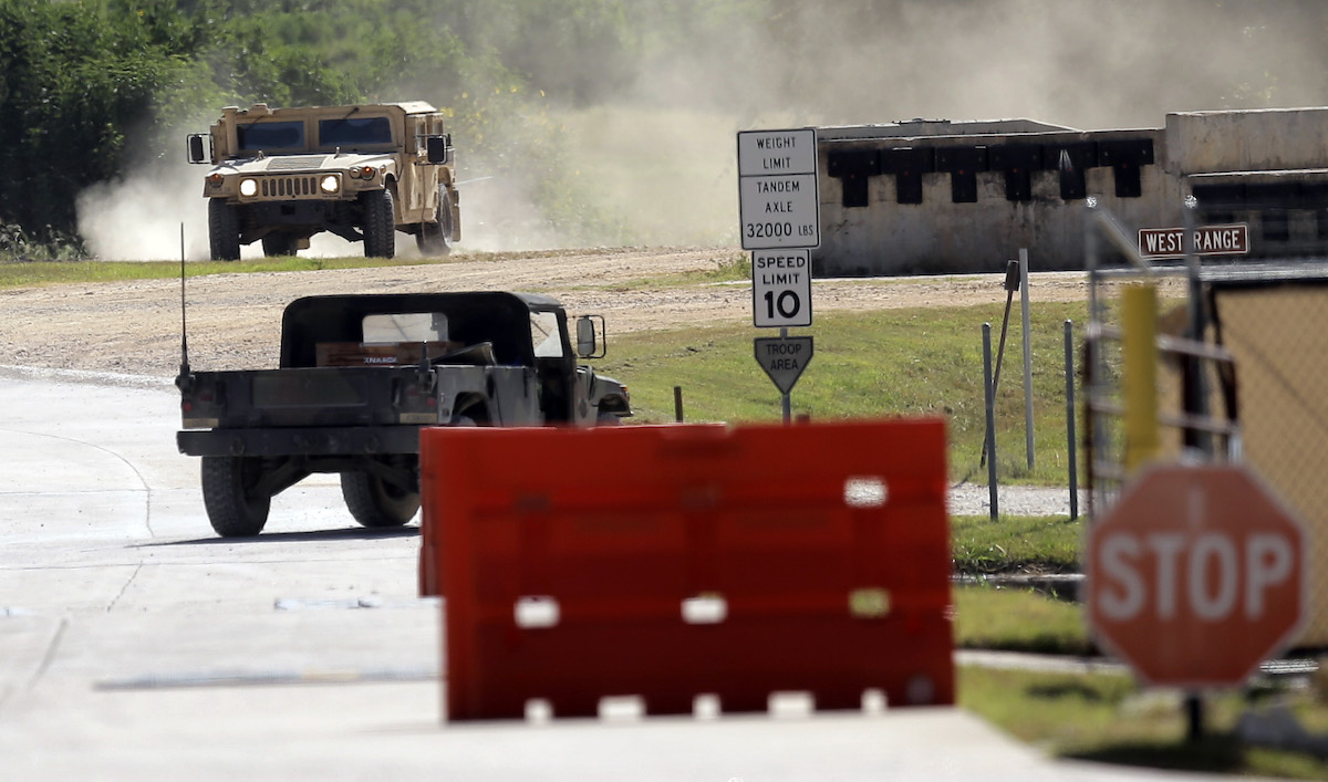 Military vehicles at Texas Army National Guard Camp Swift in Bastrop, Texas, for Jade Helm military exercise, check, 7-15-2025