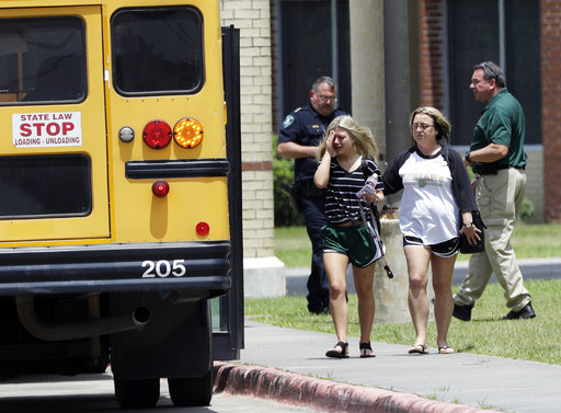 Sante Fe mourner by school bus