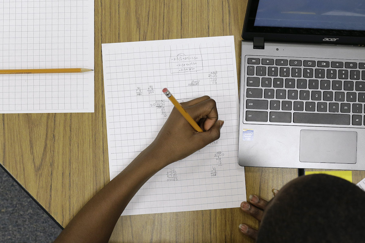 Student solving math problem