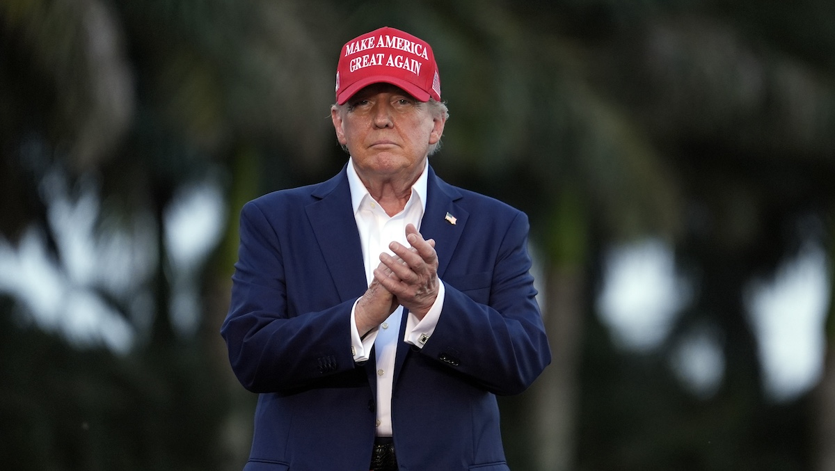 Donald Trump claps at Doral, Fla., rally, 7-9-2024
