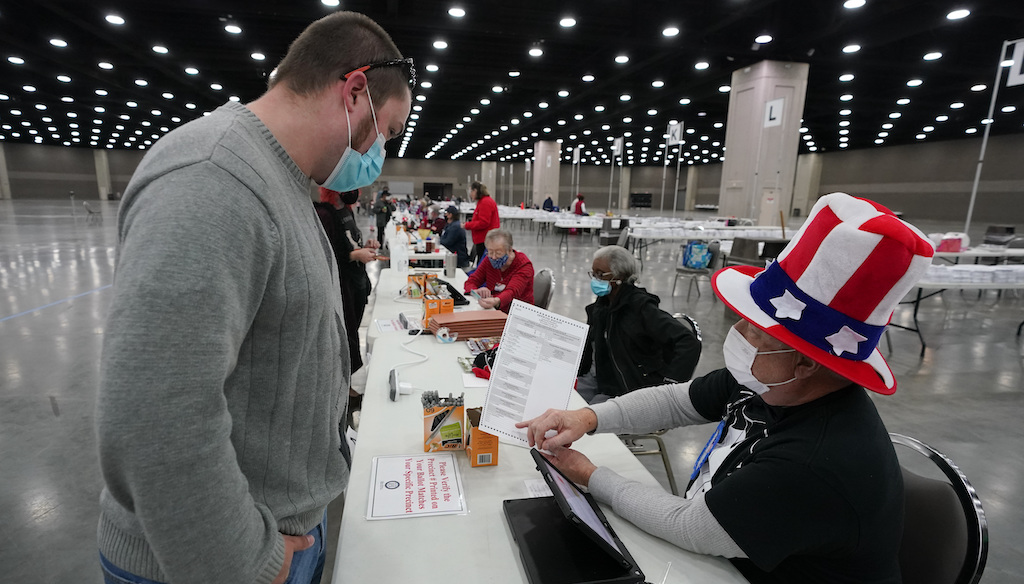 Voter casts ballot in person in Kentucky 11-3-20