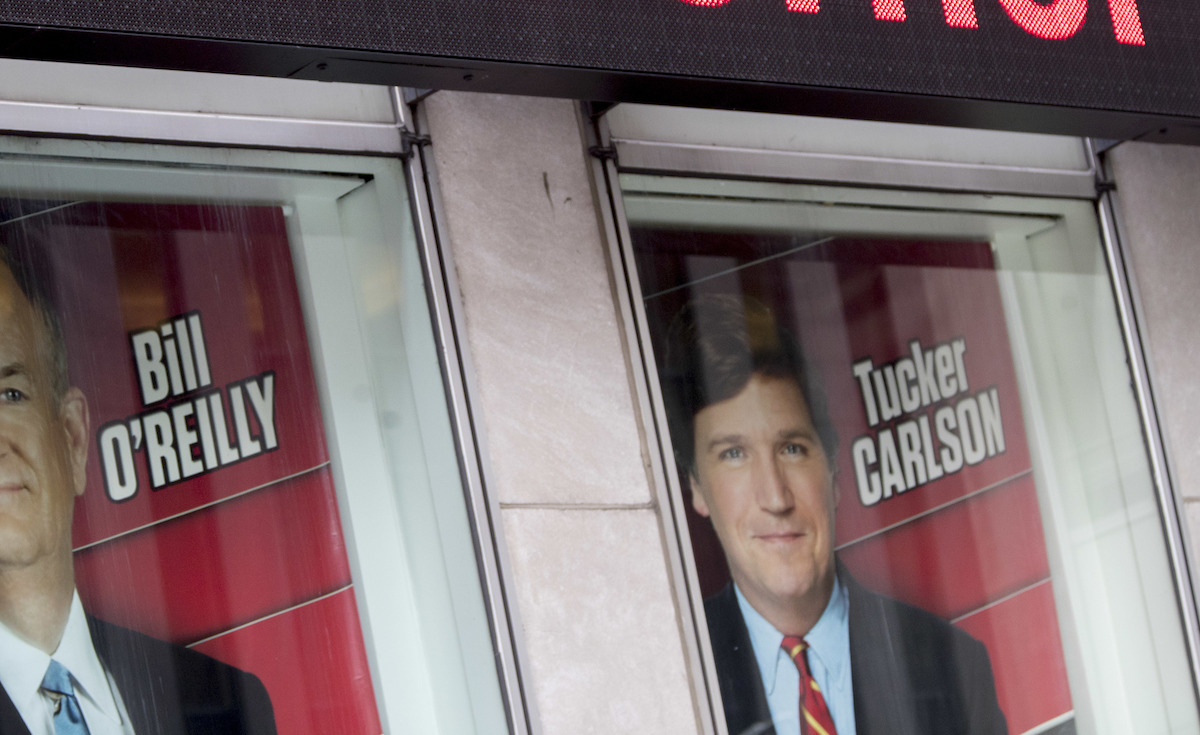 Tucker Carlson poster outside Fox News 2017, cropped