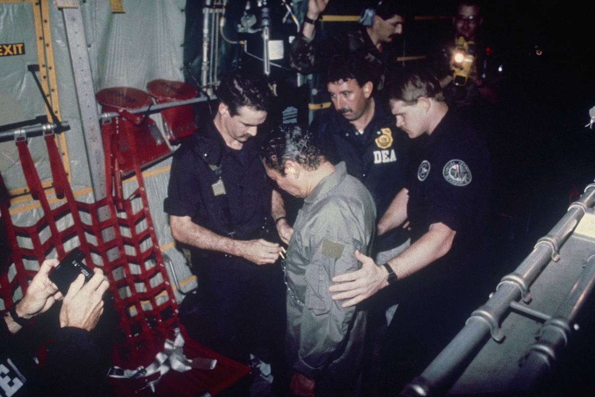 Photo of Manuel Noriega with DEA agents 01-04-1990