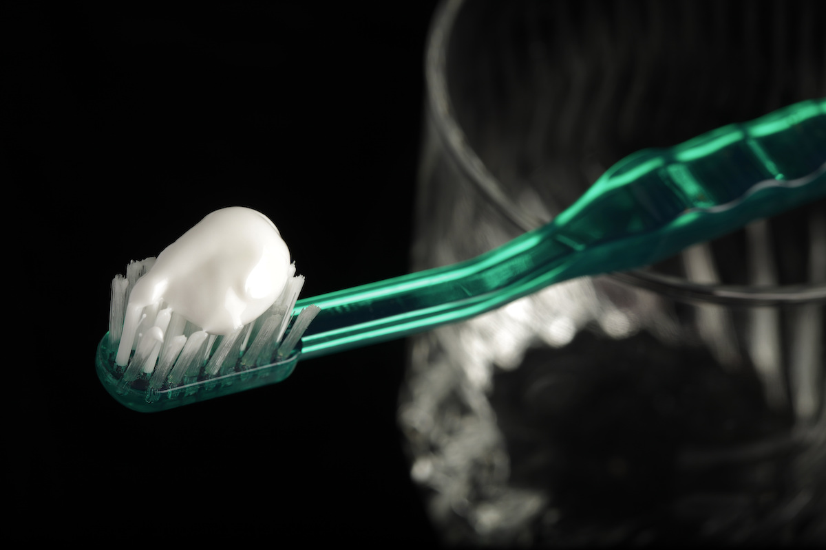 Colgate toothbrush w/ toothpaste