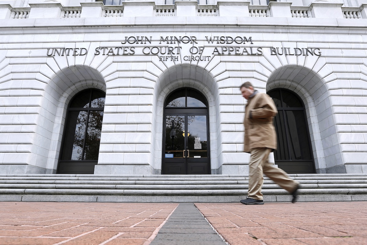 Man walks in front of 5th circuit court of appeals 01-07-2015