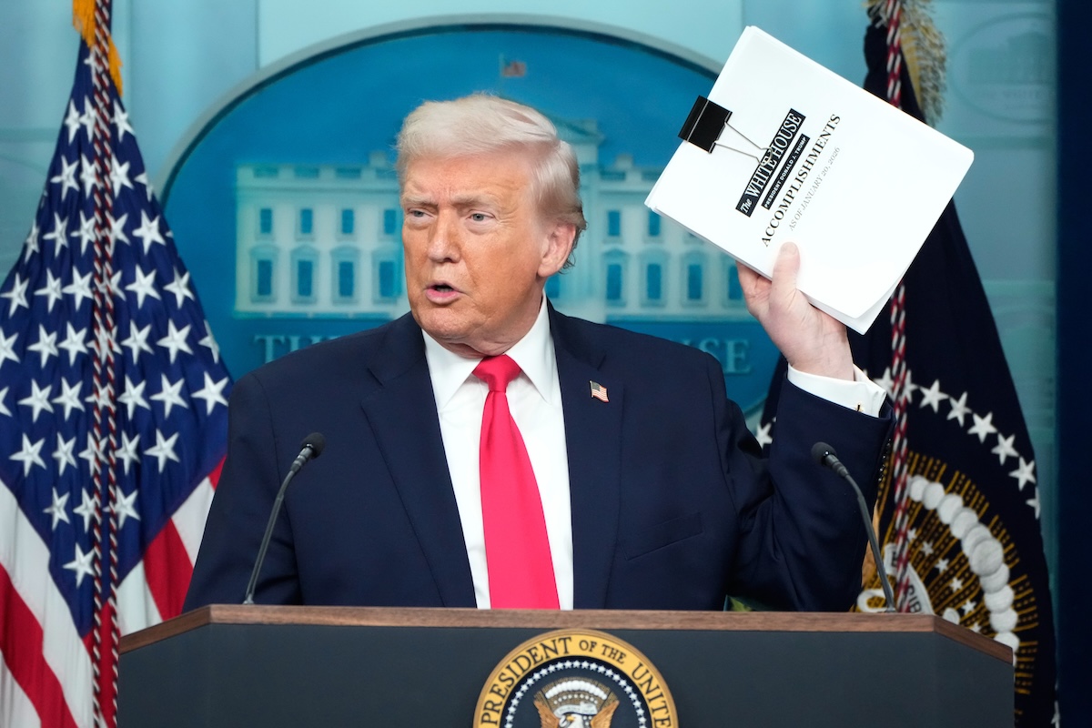 Trump at White House press room podium for 1 year anniversary
