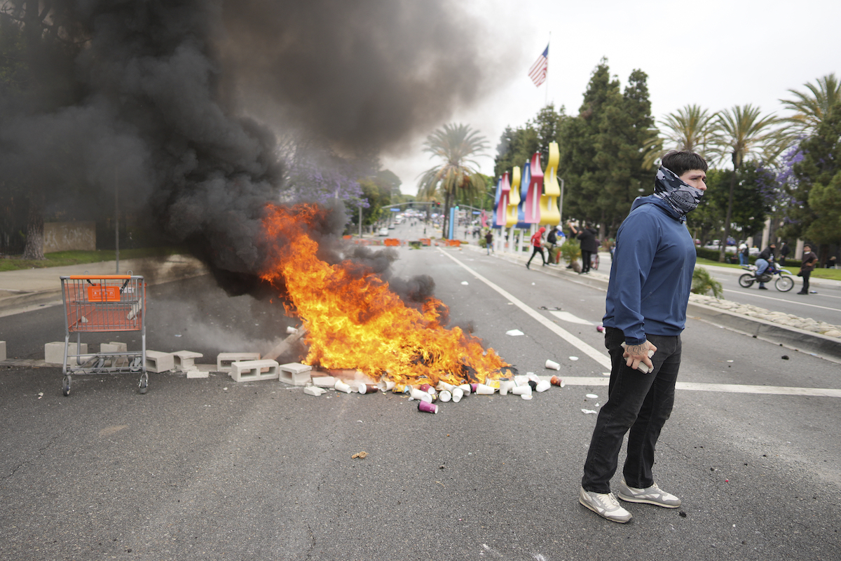 Partially masked protester LA 6-7-25