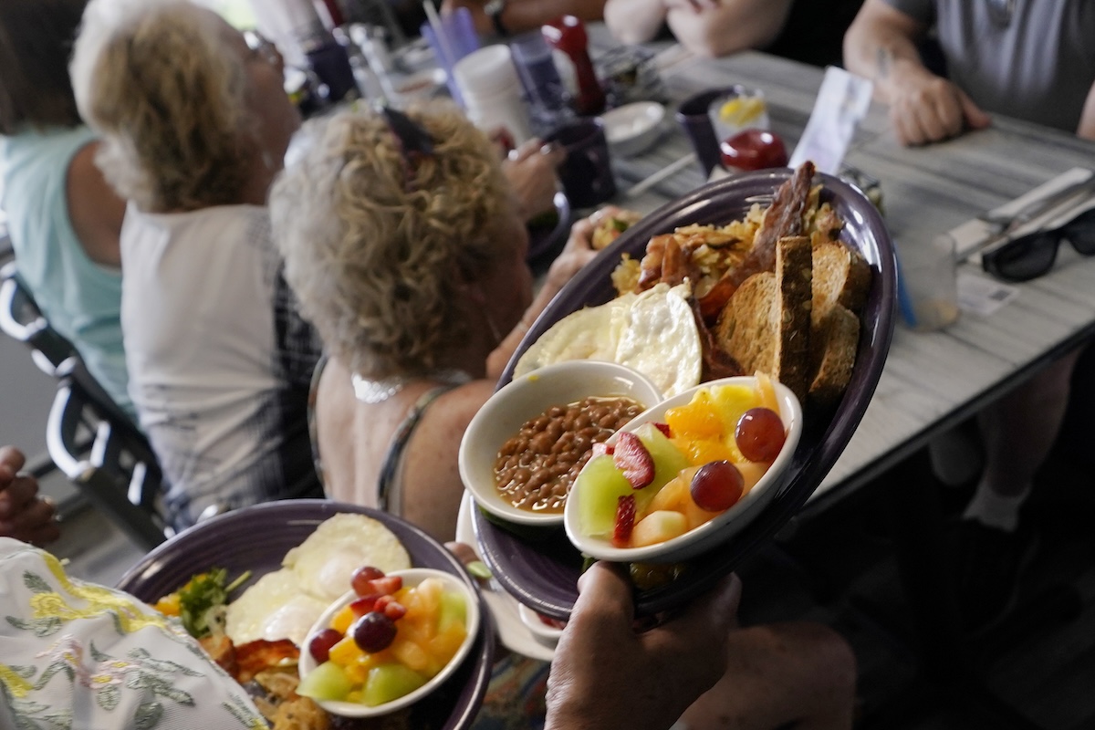Senior citizens getting breakfast